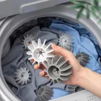 Silicone propeller ball for washing machine to remove hair from laundry
